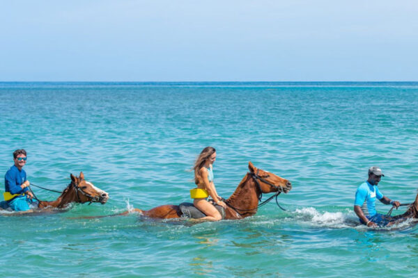 chukka island village outpost horseback ride and swim couple