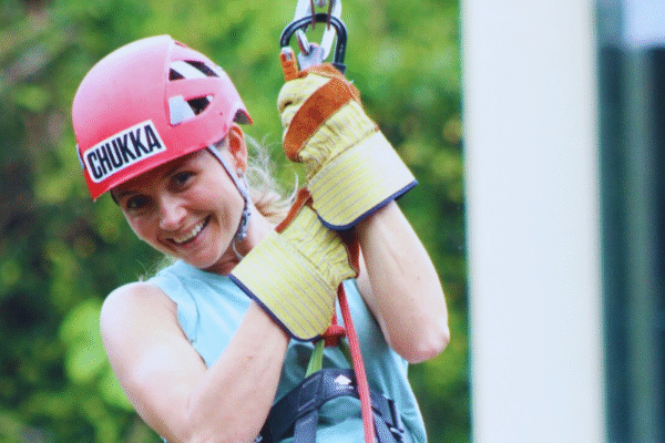 Chukka Monkey Zip and Signature Pass Woman Smiling on Zipline