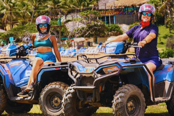 Chukka Ocean Single Man and Woman Smiling on Parked ATVs