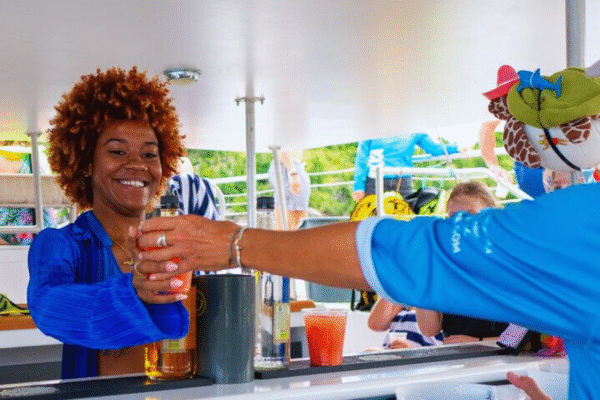 Chukka Private Catamaran Charter Staff Serving Beverage