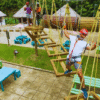 Chukka Zipline and Challenge Course Man Having Fun on Challenge Course