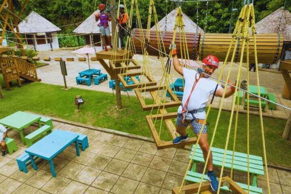 Chukka Zipline and Challenge Course Man Having Fun on Challenge Course