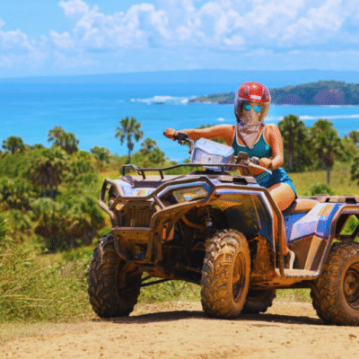 Chukka Ocean Double: ATV or Dune Buggy and Ocean Zipline Adventure Lady on ATVs