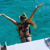 SeaFari FastCat Woman Jumping in Water