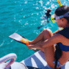 SeaFari FastCat Woman Putting on Swimming Gears