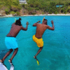 SeaFari FastCat Two Men Jumping Off Boat in Water
