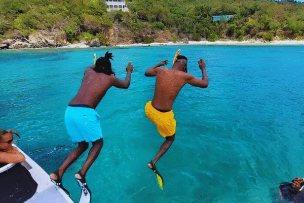 SeaFari FastCat Two Men Jumping Off Boat in Water